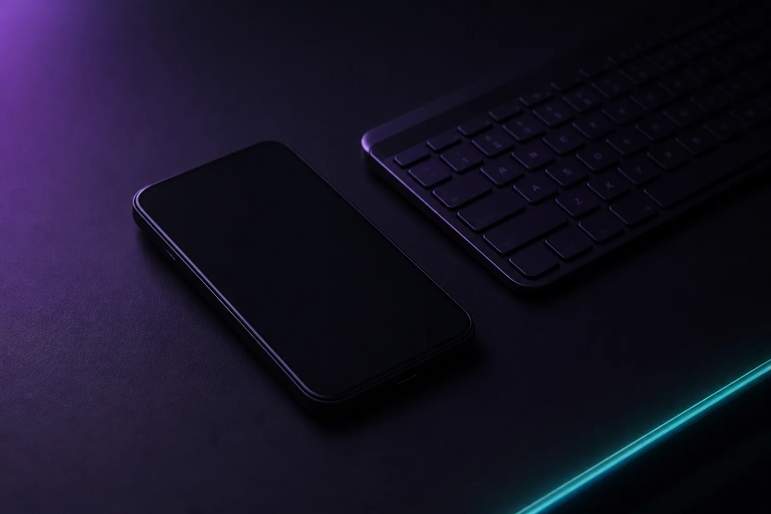Escritorio oscuro con un teléfono y un teclado bajo luz violeta y borde cian
